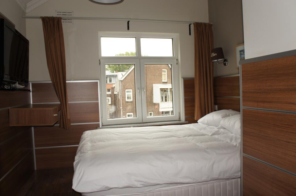 Hotel Erasmus Роттердам Номер фото